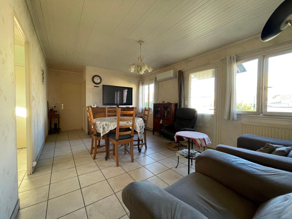 Maison familiale avec 4 chambres, grand garage et terrai....