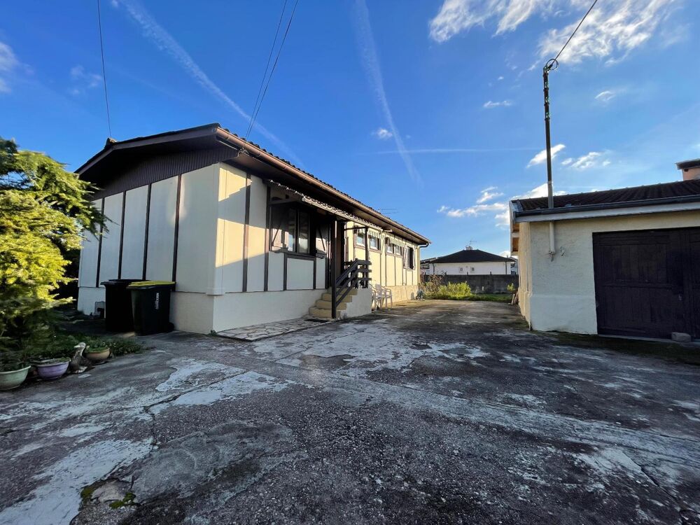 Maison familiale avec 4 chambres, grand garage et terrai....