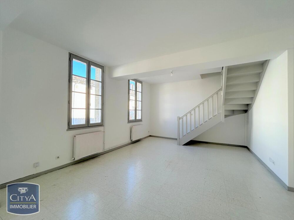 COUTRAS - GRAND APPARTEMENT T3 EN DUPLEX Découvrez cet a....