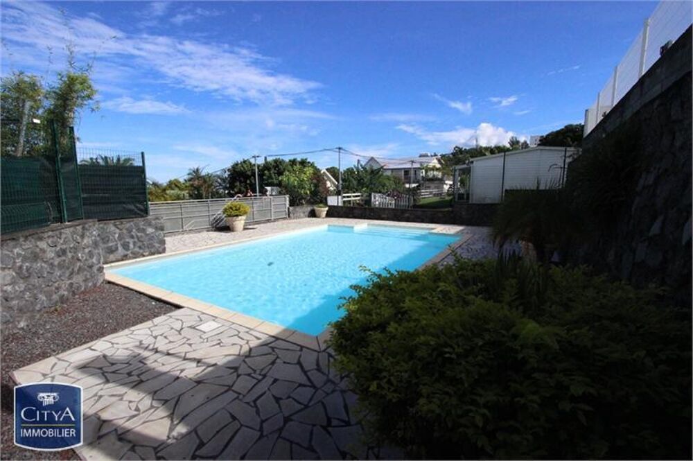 VENTE d'un appartement T4 (74 m²) avec garage à Le Tampo....