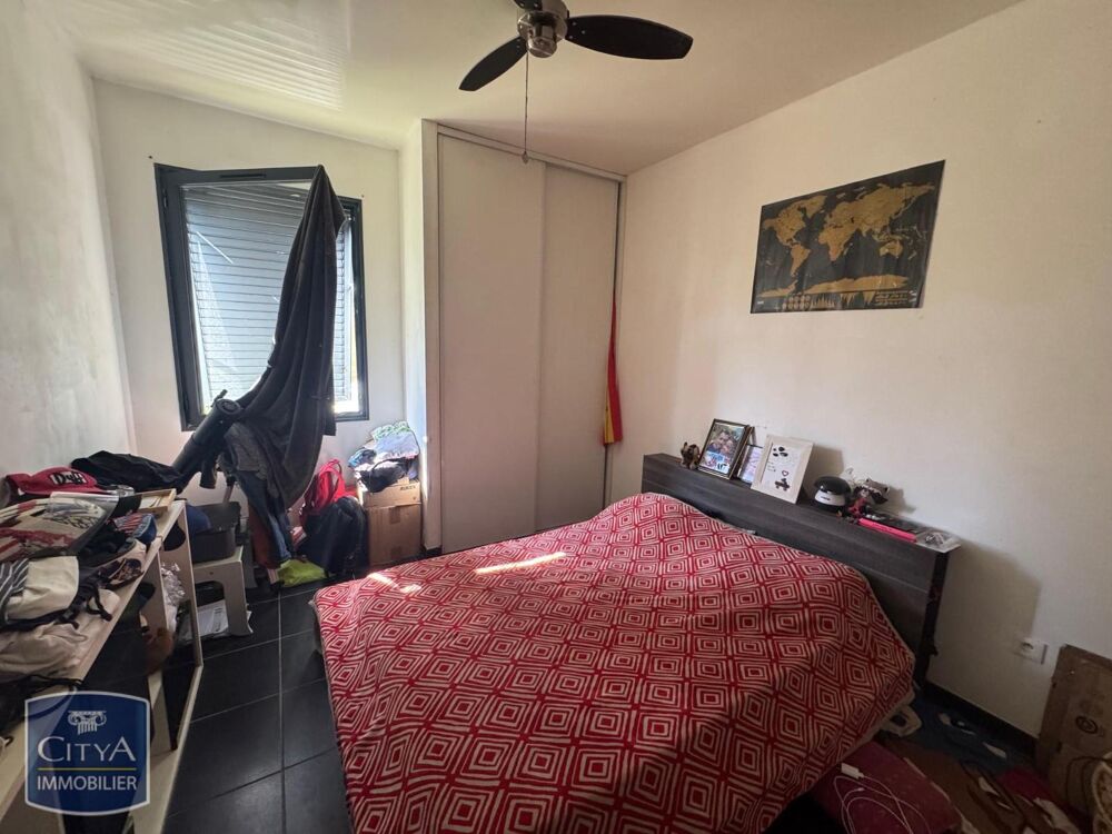 VENTE d'un appartement non meublé, idéalement situé sans....