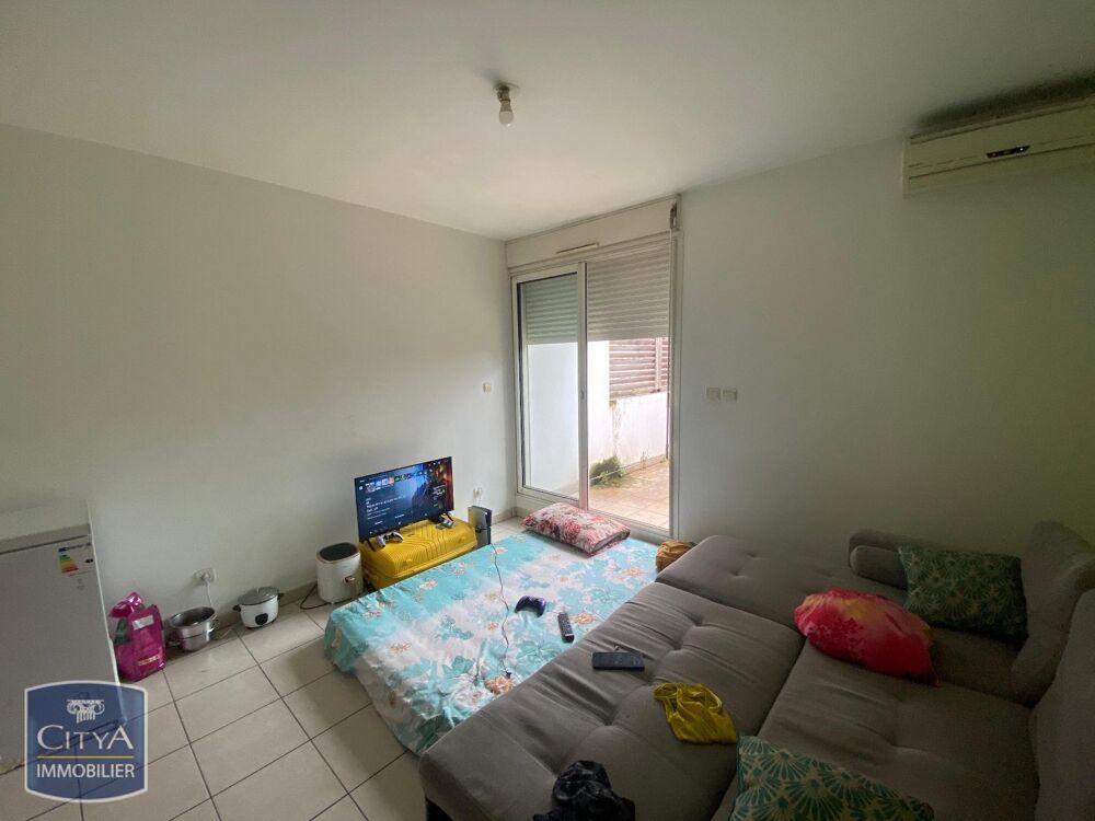 VENTE d'un studio au RDC avec cour extérieure et locatai....