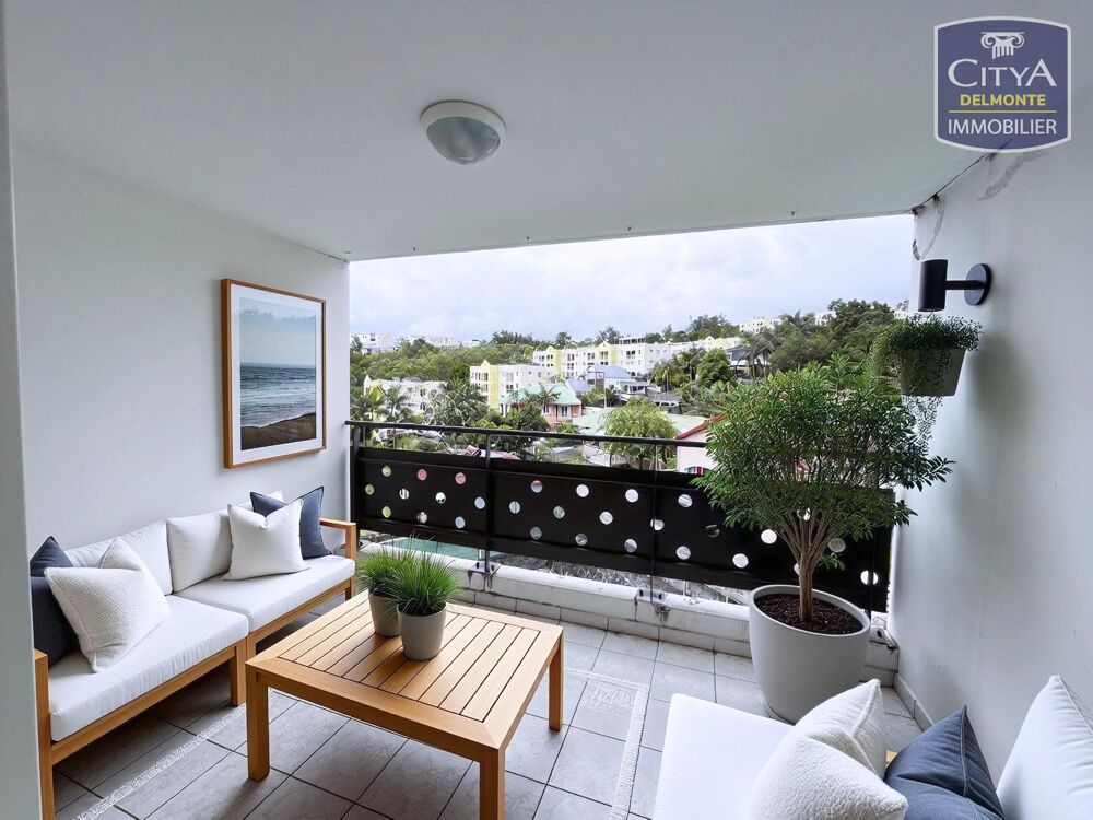 VENTE d'un appartement T4 (74 m²) avec garage à Le Tampo....