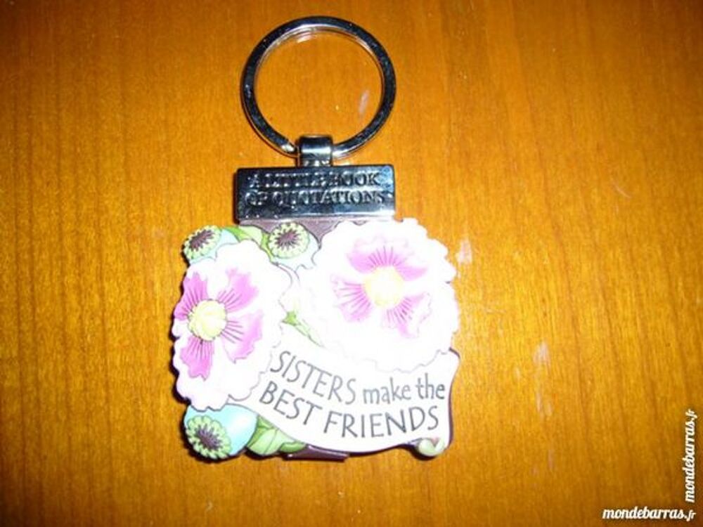 rare porte-clef fleurs en relief - citations int&eacute;r Bijoux et montres