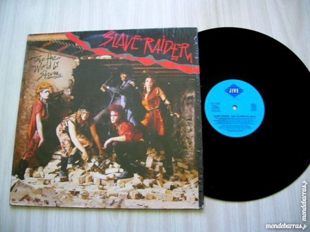 33 TOURS SLAVE RAIDER Take the world by storm CD et vinyles