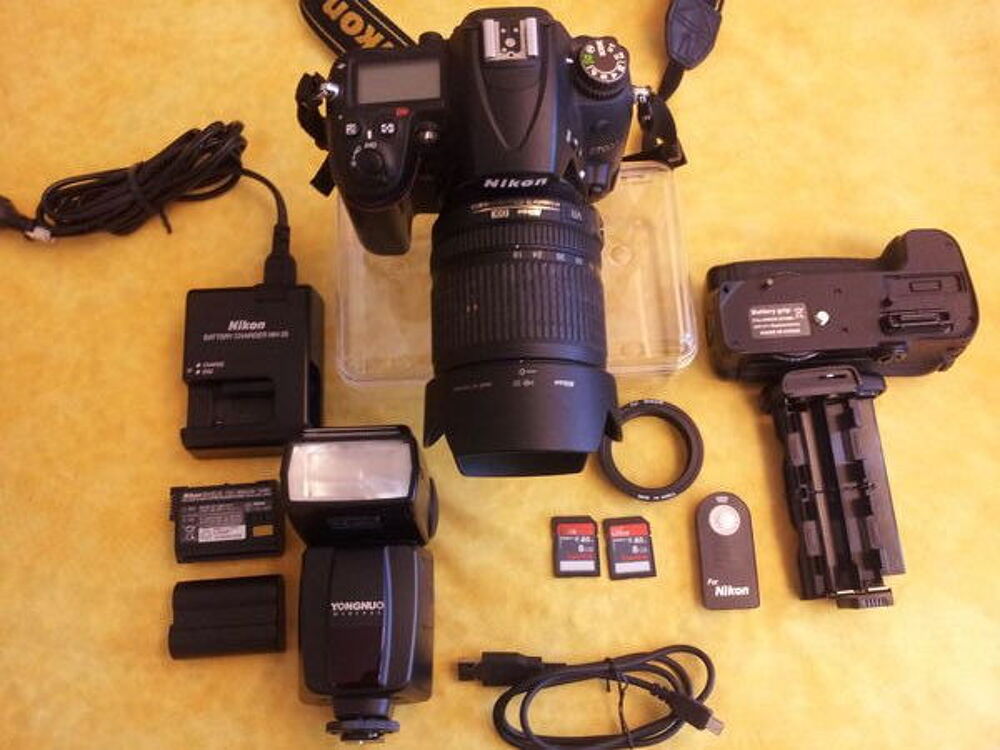 NIKON D-7000 Boitier + 3 Objectifs + Flash +++++
Photos/Video/TV