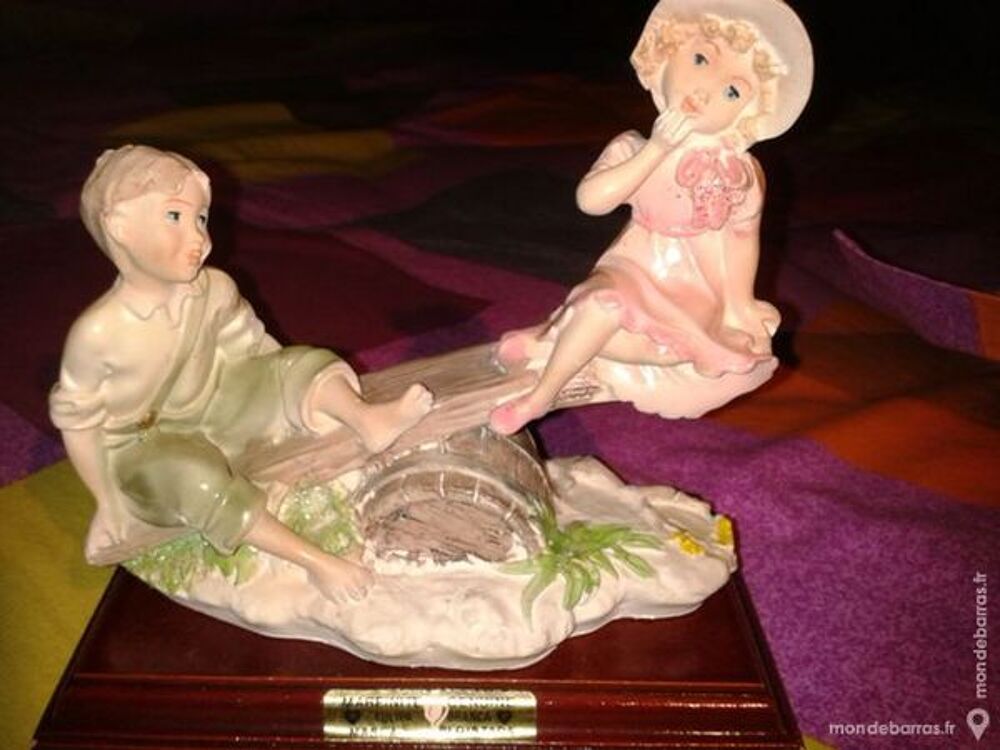 Statue enfants et la balancoire en marfine Décoration
