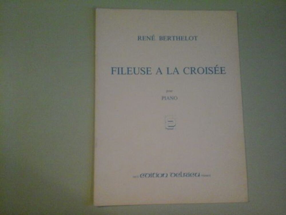 FILEUSE A LA CROISEE DE RENE BERTHELOT Instruments de musique