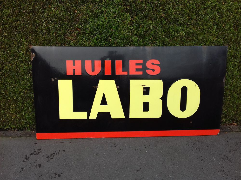ancien panneau publicitaire Huiles Labo 