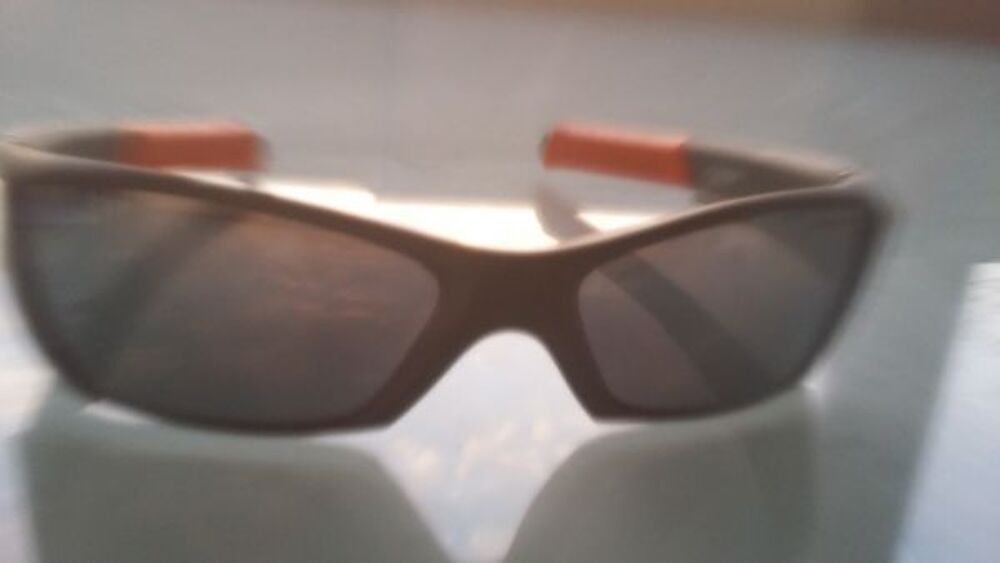 Paire de lunettes de soleil "Julbo" Bijoux et montres