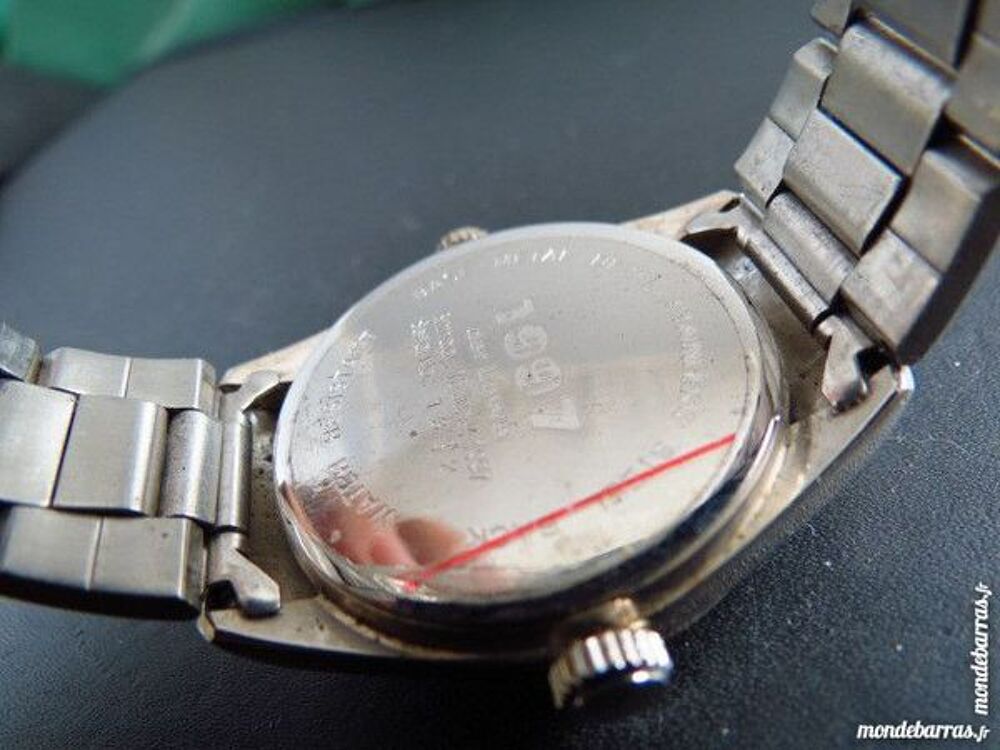 DER L&Ouml;WE 1997 MONTRE 2 cadrans DIV0313 Bijoux et montres