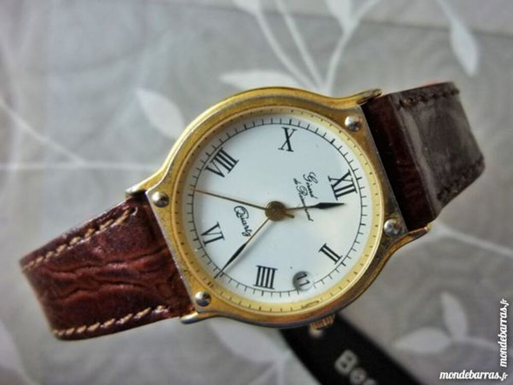 G&eacute;rard de R&eacute;aumont montre dame 4 CLOUS GDR0001 Bijoux et montres