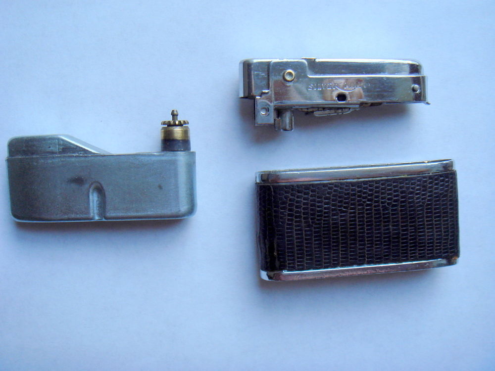 Briquet Silver Match gain&eacute; cuir &agrave; cartouche gaz.
