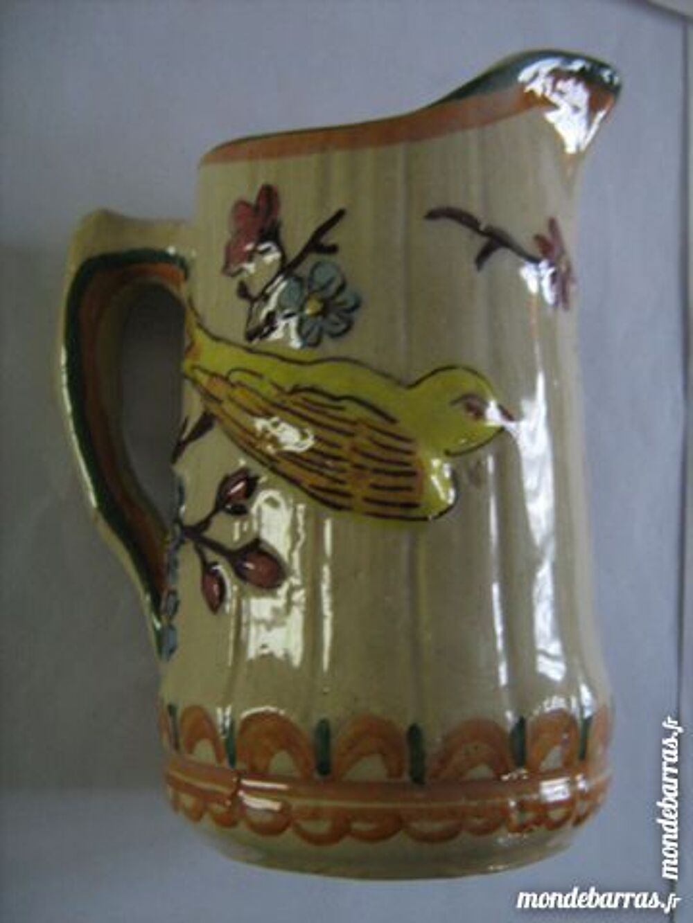 PICHET EN BARBOTINE A DECORS D'OISEAUX 