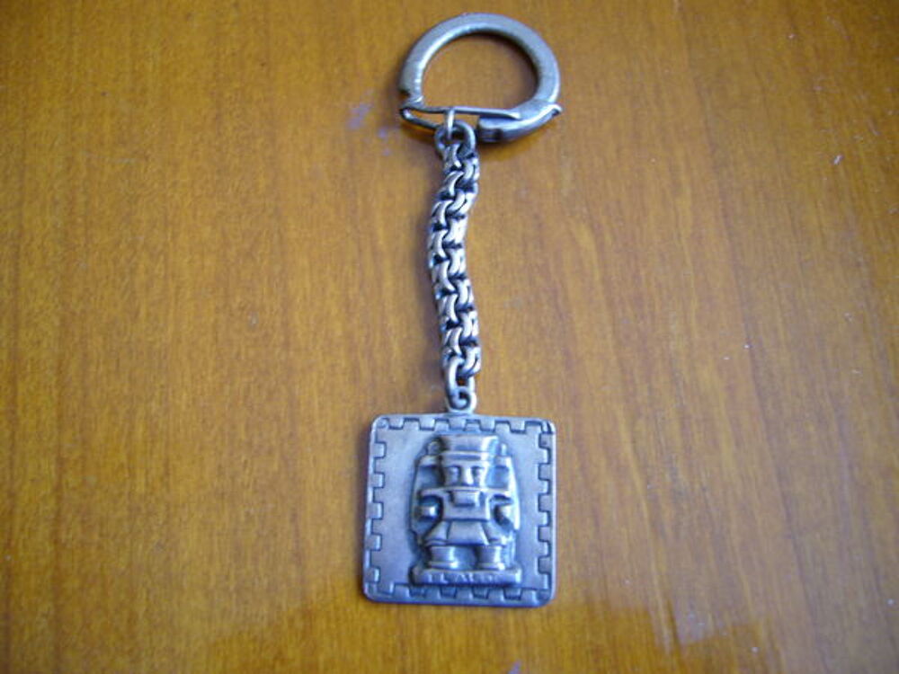 superbe porte cl&eacute; argent massif (avec poin&ccedil;on) Bijoux et montres