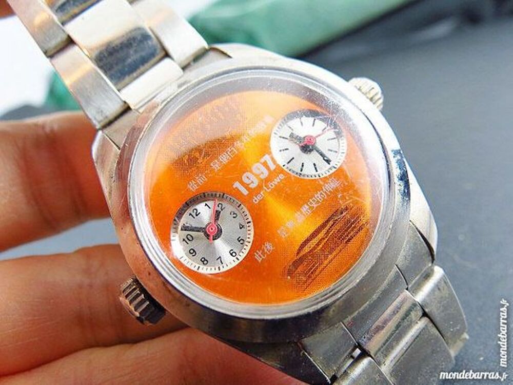 DER L&Ouml;WE 1997 MONTRE 2 cadrans DIV0313 Bijoux et montres