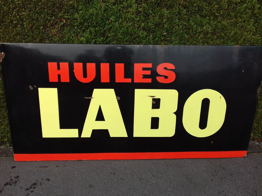 ancien panneau publicitaire Huiles Labo 