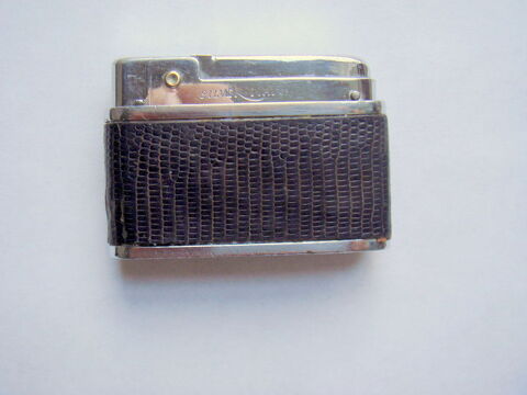 Briquet Silver Match gain cuir  cartouche gaz.
10 Paris 15 (75)