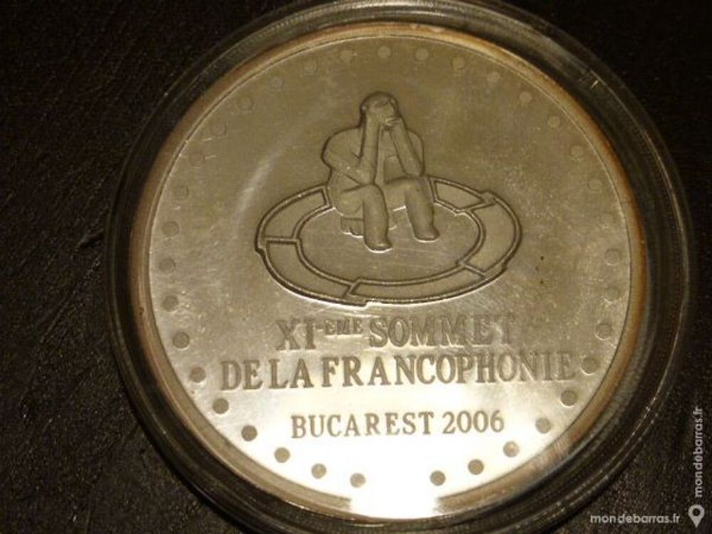 M&eacute;daille argent dans sa capsule d'origine 