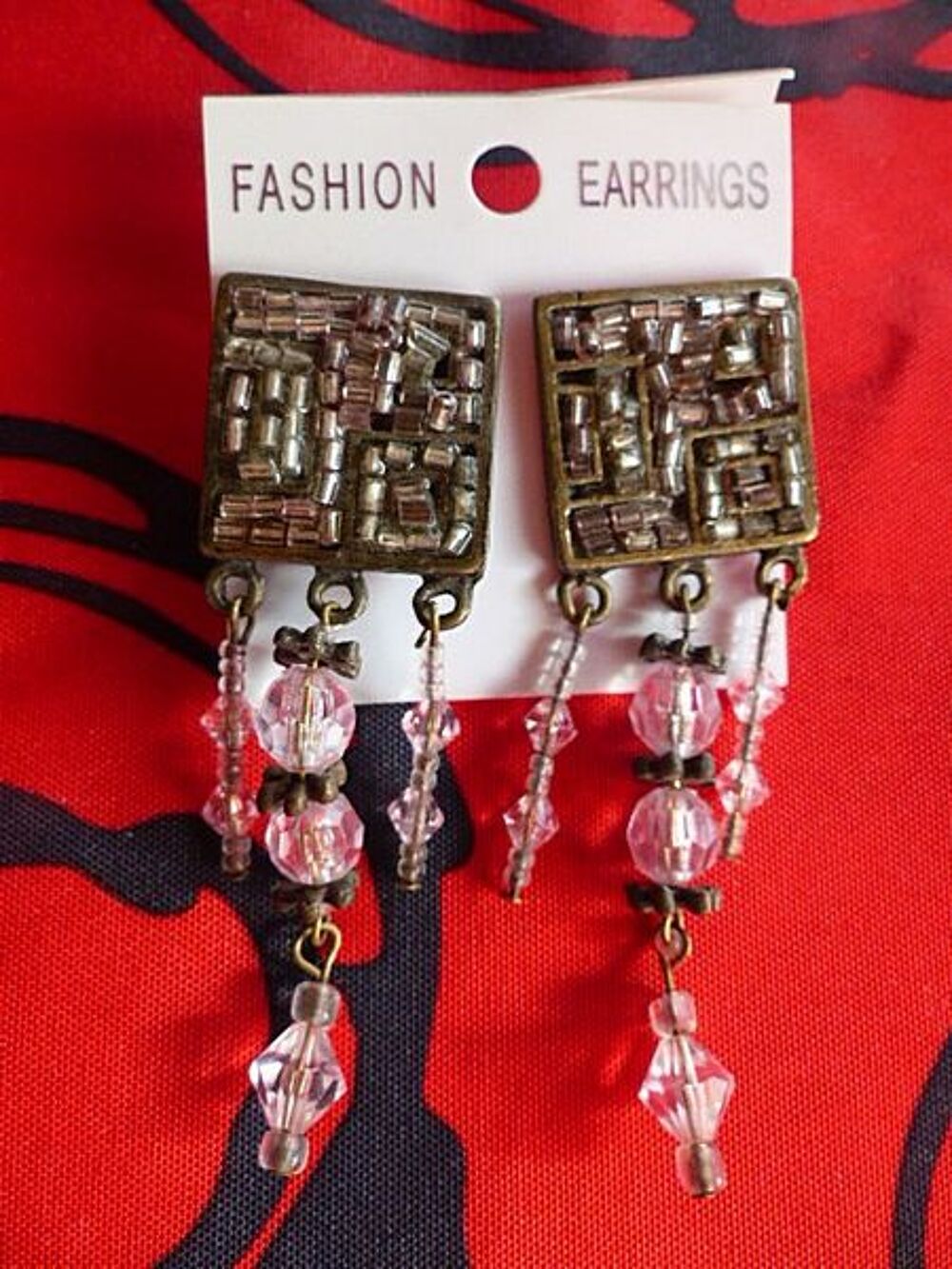 boucle d'oreille perle rose Bijoux et montres