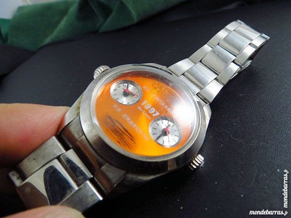 DER L&Ouml;WE 1997 MONTRE 2 cadrans DIV0313 Bijoux et montres