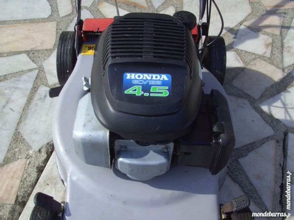 tondeuse tract&eacute;e moteur honda 4.5cv vidang&eacute; Jardin