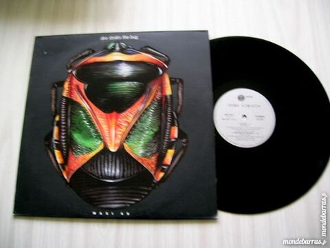 MAXI 45 TOURS DIRE STRAITS The bug - PROMO 45 Nantes (44)