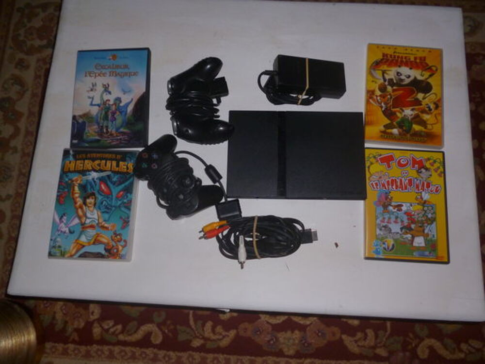 une playStation 2 Consoles et jeux vidéos