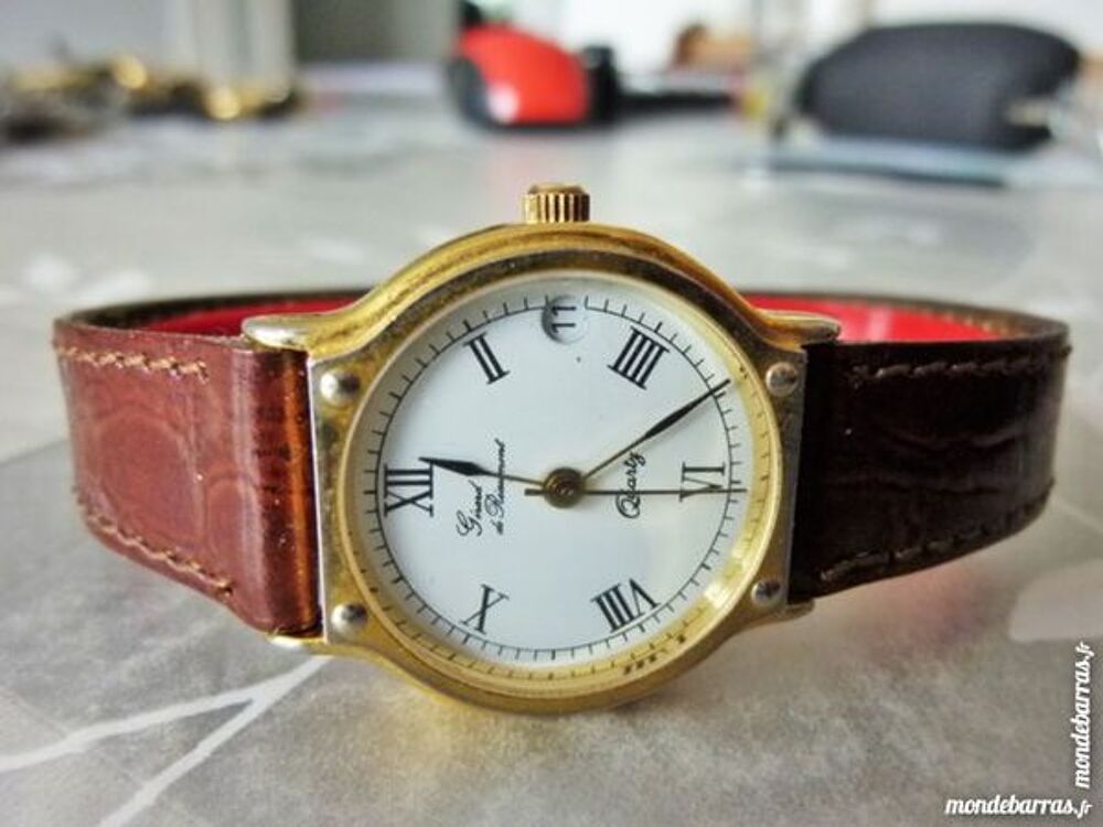 G&eacute;rard de R&eacute;aumont montre dame 4 CLOUS GDR0001 Bijoux et montres