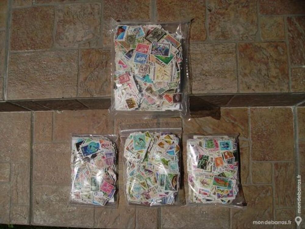 LOT DE 2.500 TIMBRES-POSTE DU MONDE (69 pays) 