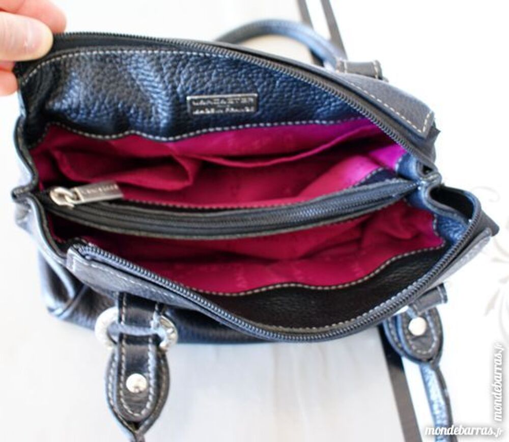 Petit sac vintage noir cuir Lancaster Maroquinerie