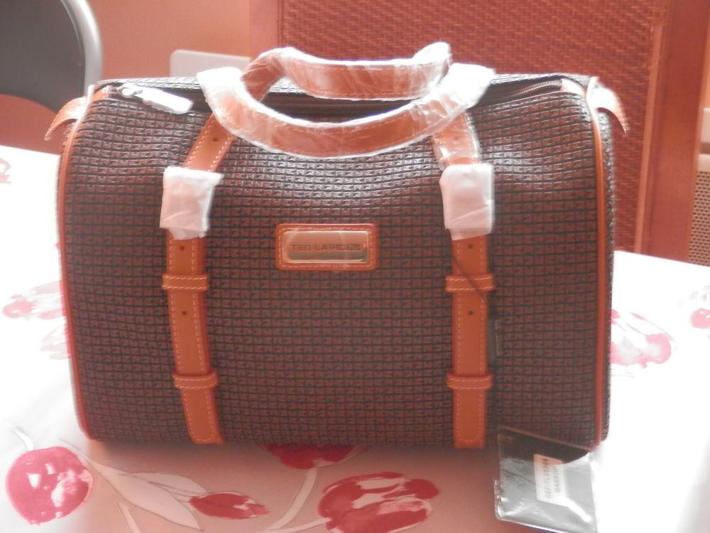 Sac polochon fidelio Ted lapidus marron Maroquinerie