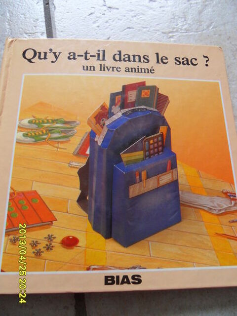 Livre anim Qu'y a t-il- dans le sac ? 4 Montvrain (77)