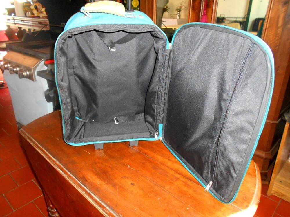 Valise bagage de voyage pratique sur roulettes Maroquinerie
