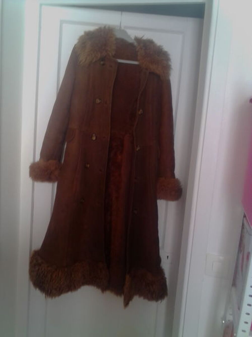 manteau en peau retourn&eacute;e Vêtements