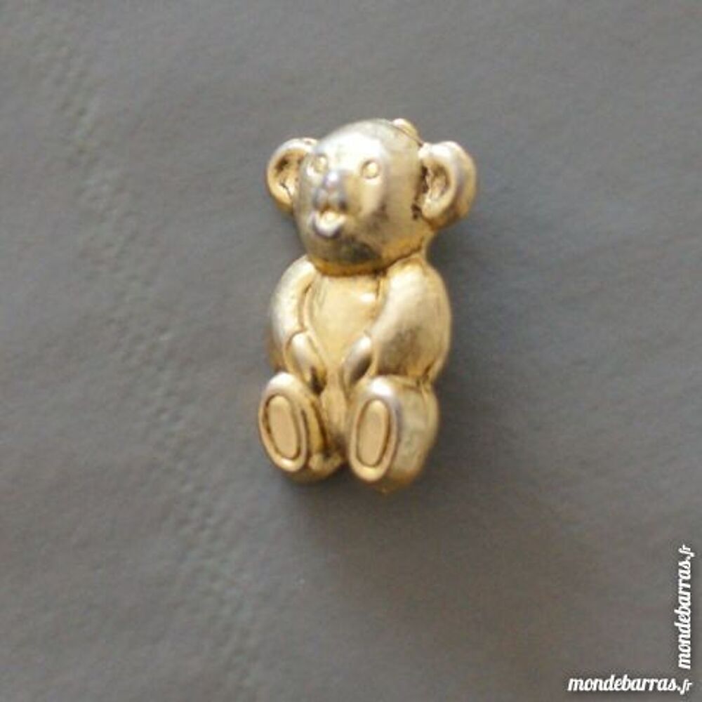 Broche dor&eacute;e ours Bijoux et montres