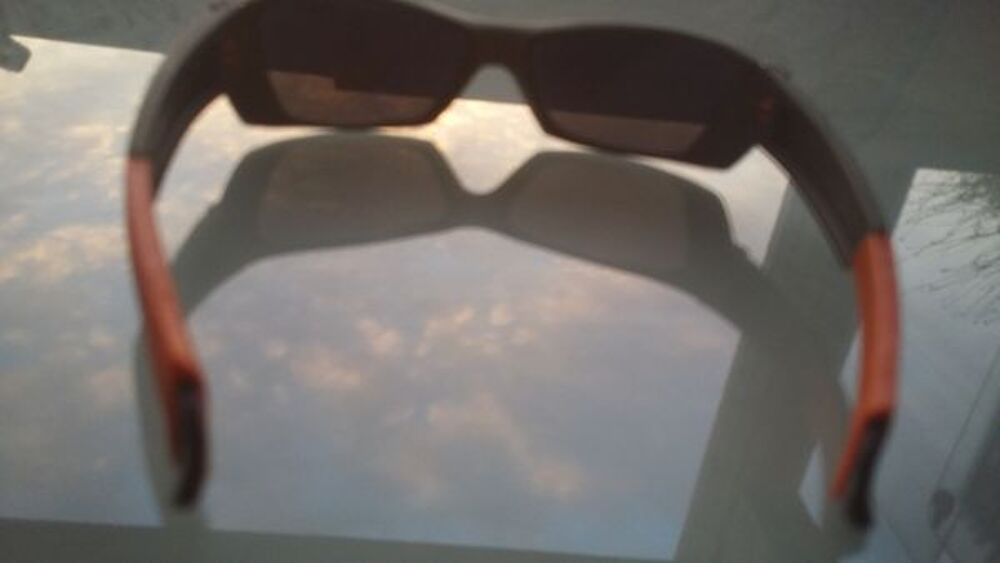 Paire de lunettes de soleil "Julbo" Bijoux et montres
