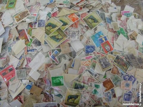 trs gros lot de 1 KG de timbres du monde 35 Annay (58)
