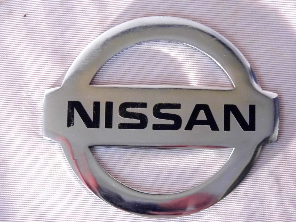 Plaque logo mascotte voiture NISSAN embleme insigne 