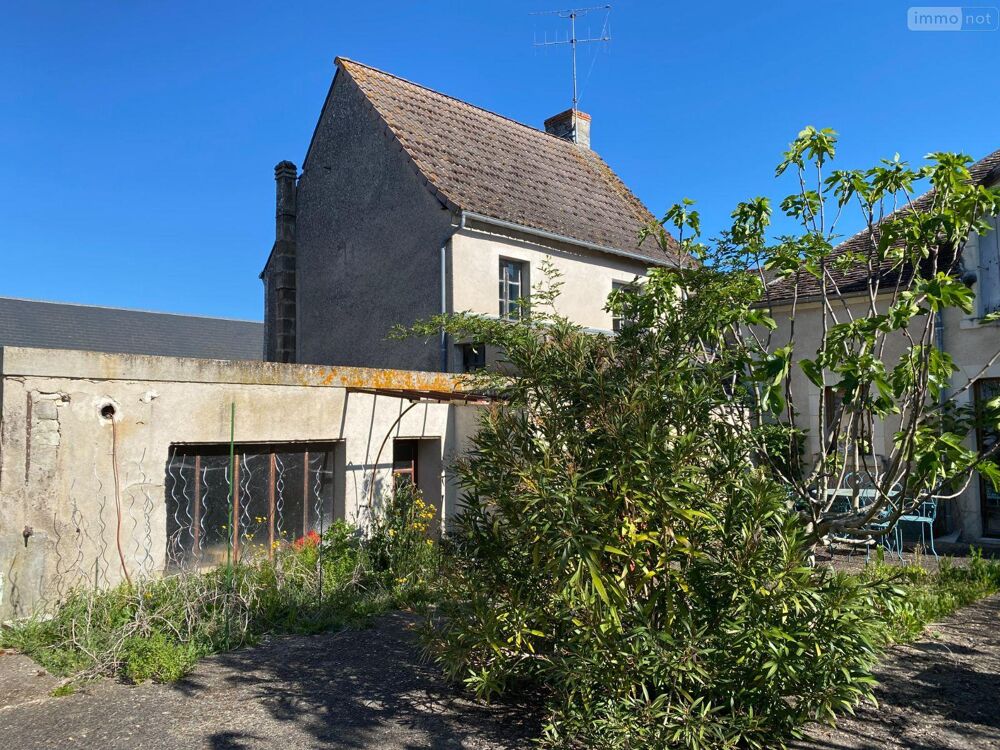 Un ensemble immobilier composé de deux habitations situé....