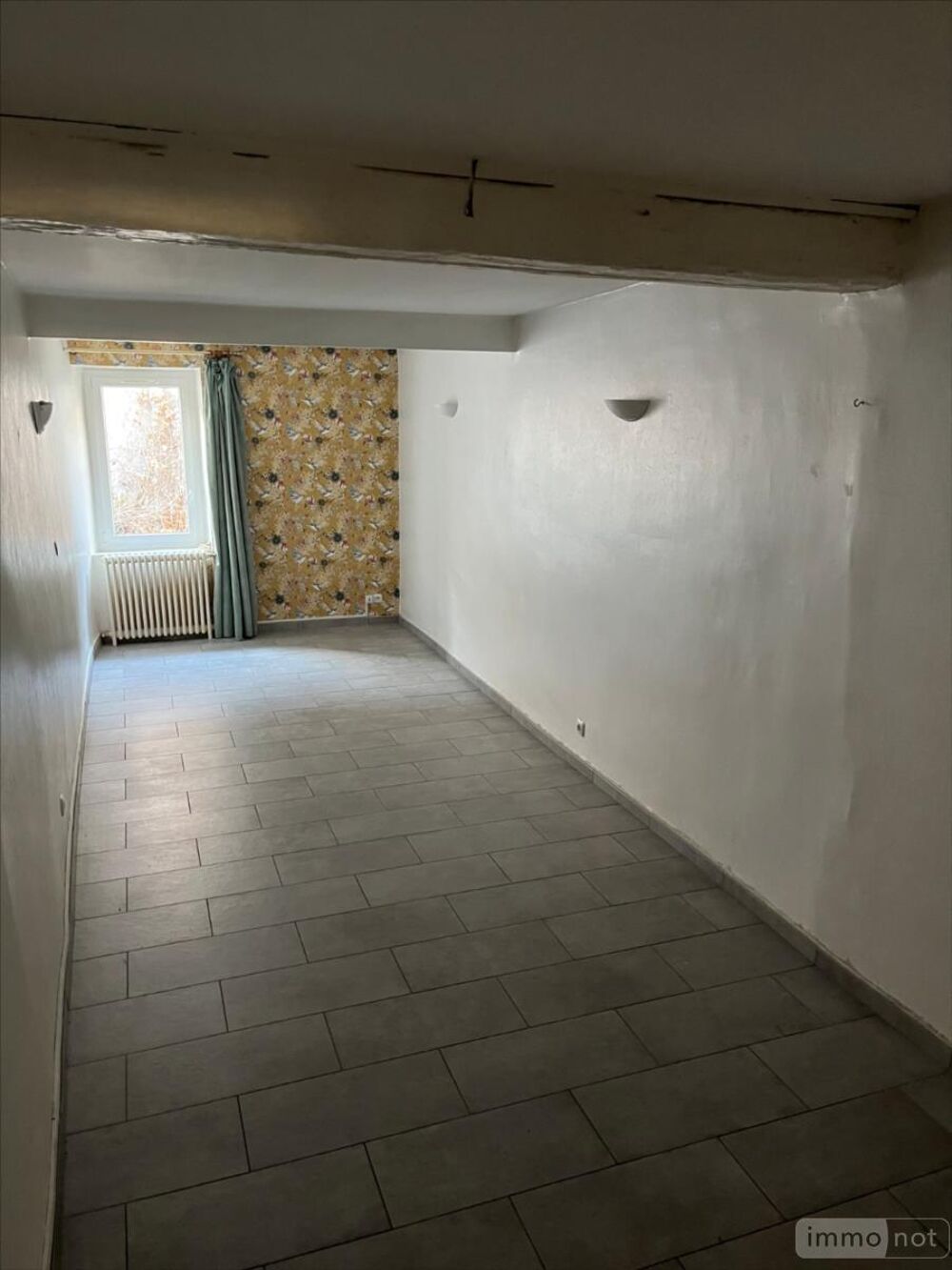 MAISON au coeur de Montluel composée au rez de chaussée ....