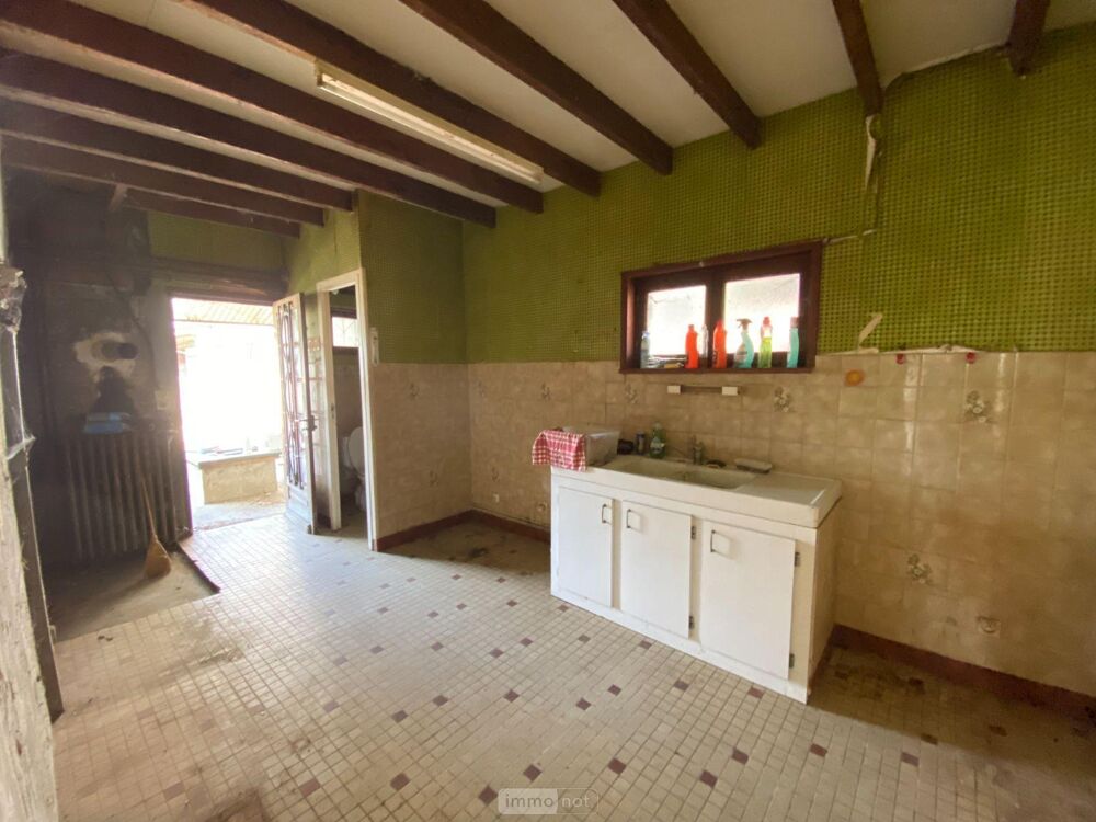 Maison ancienne avec dépendances, composée : D''une c....