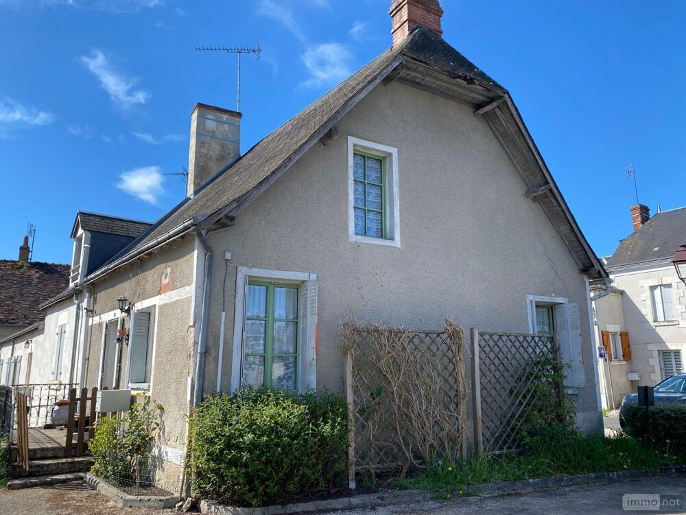 Une maison ancienne en centre bourg composée d''une pièc....