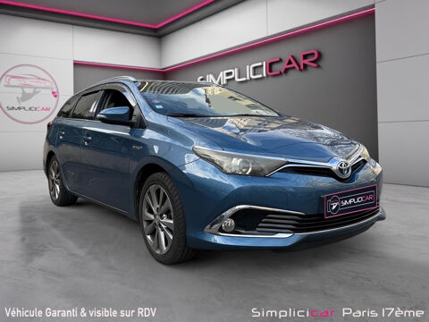 Toyota Auris Touring Sports Hybride 136h Design 2016 occasion Paris 75017