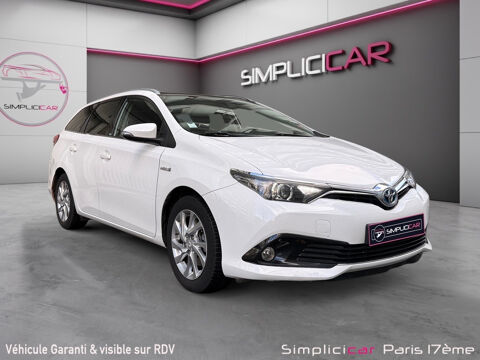 Toyota Auris Touring Sports Hybride 136h Design 2016 occasion Paris 75017
