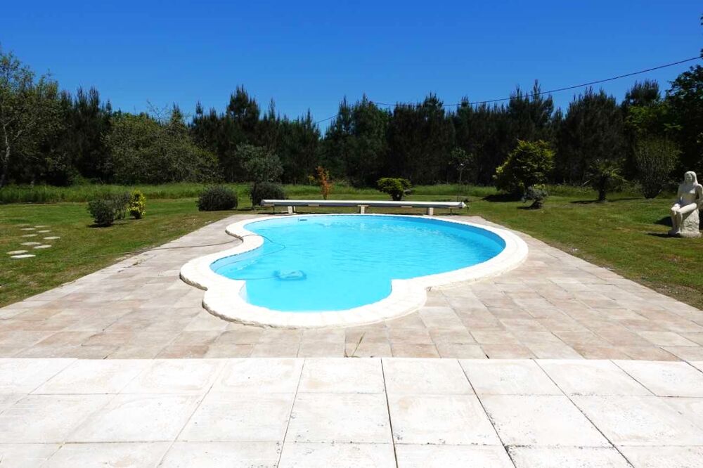 Belle Landaise cuisine séjour salon 4 chambres piscine dépendance 130m² 2000 m² terrain clos.